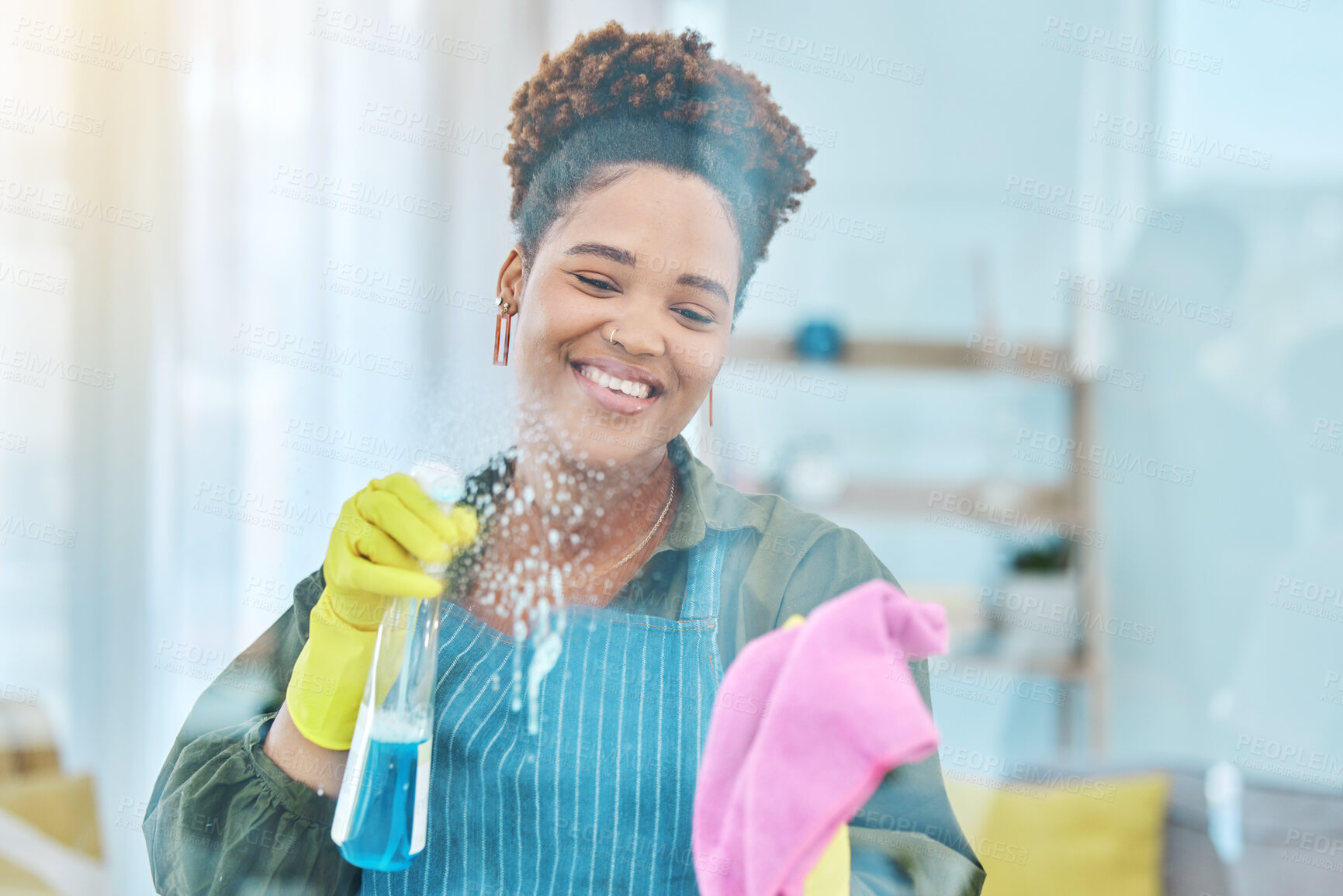 Buy stock photo African woman, cleaning window with chemical spray and cloth, smile for hygiene and housekeeping or hospitality. Cleaner, liquid detergent and disinfectant, service or maintenance with labor and foam