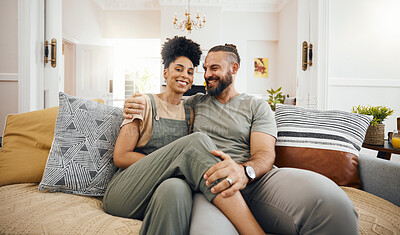 Buy stock photo Home, love and couple with marriage, relax or commitment with happiness, bonding or romance in a lounge. People, man or woman on sofa, portrait or romantic with relationship, trust or loving together