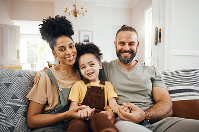 Buy stock photo Interracial family, portrait and parents with child relax on couch, bonding and happy together at home. Smile, love and care with trust and support, people in living room, man and woman with kid