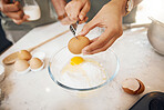 Hands with fork, crack egg and cooking in kitchen on bowl on table in home. Food, bakery and break eggshell for ingredient in flour for healthy diet, protein nutrition or person in pastry preparation