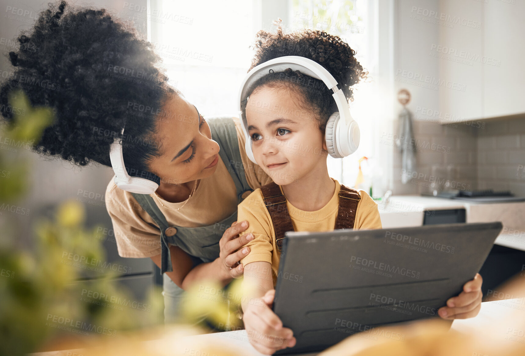 Buy stock photo Mother, child and tablet with headphones, home or happy for movie, music or streaming subscription. Mom, kid and digital touchscreen for education, learning or online course with help in family house