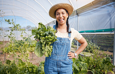 Buy stock photo Farming, agriculture and woman with vegetables in a greenhouse for health and sustainability. Portrait of a young farmer with spinach for eco lifestyle, agro startup or organic food for wellness