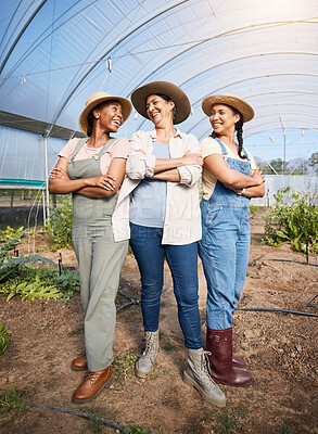 Buy stock photo Farming, group of women in greenhouse with confidence at sustainable small business and agriculture. Happy farmer team at vegetable farm, agro pride and diversity with eco friendly organic plants.