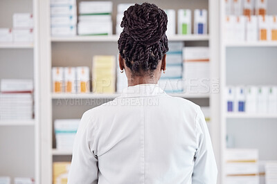 Buy stock photo Pharmacy, pharmacist back and medicine shelf for healthcare inventory, stock management and boxes check. Medical person or doctor search for pills or tablet package in clinic service or retail drugs