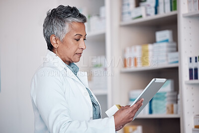 Buy stock photo Woman, pharmacist and tablet technology, medicine shelf or healthcare inventory of boxes or stock management. Medical, pharmacy or mature doctor reading pills, product package or drugs in e commerce