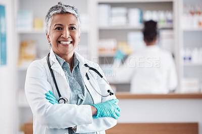 Buy stock photo Senior, woman and doctor, portrait with arms crossed and healthcare, medical professional and hospital dispensary. Pharmacy, health and confidence, smile with wellness and drugs, medicine and service