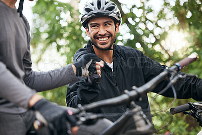 Buy stock photo Fist bump, happy and cycling with friends in nature for fitness, health and partnership. Teamwork, motivation and sports adventure with men training in forest for wellness, workout and freedom
