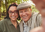 Selfie, smile and senior couple in a park happy, bond and having fun in nature together. Portrait, love and elderly man with old woman in a forest smile for profile picture while enjoying retirement