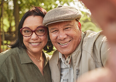 Buy stock photo Selfie, smile and senior couple in a park happy, bond and having fun in nature together. Portrait, love and elderly man with old woman in forest for profile picture, enjoying marriage in retirement