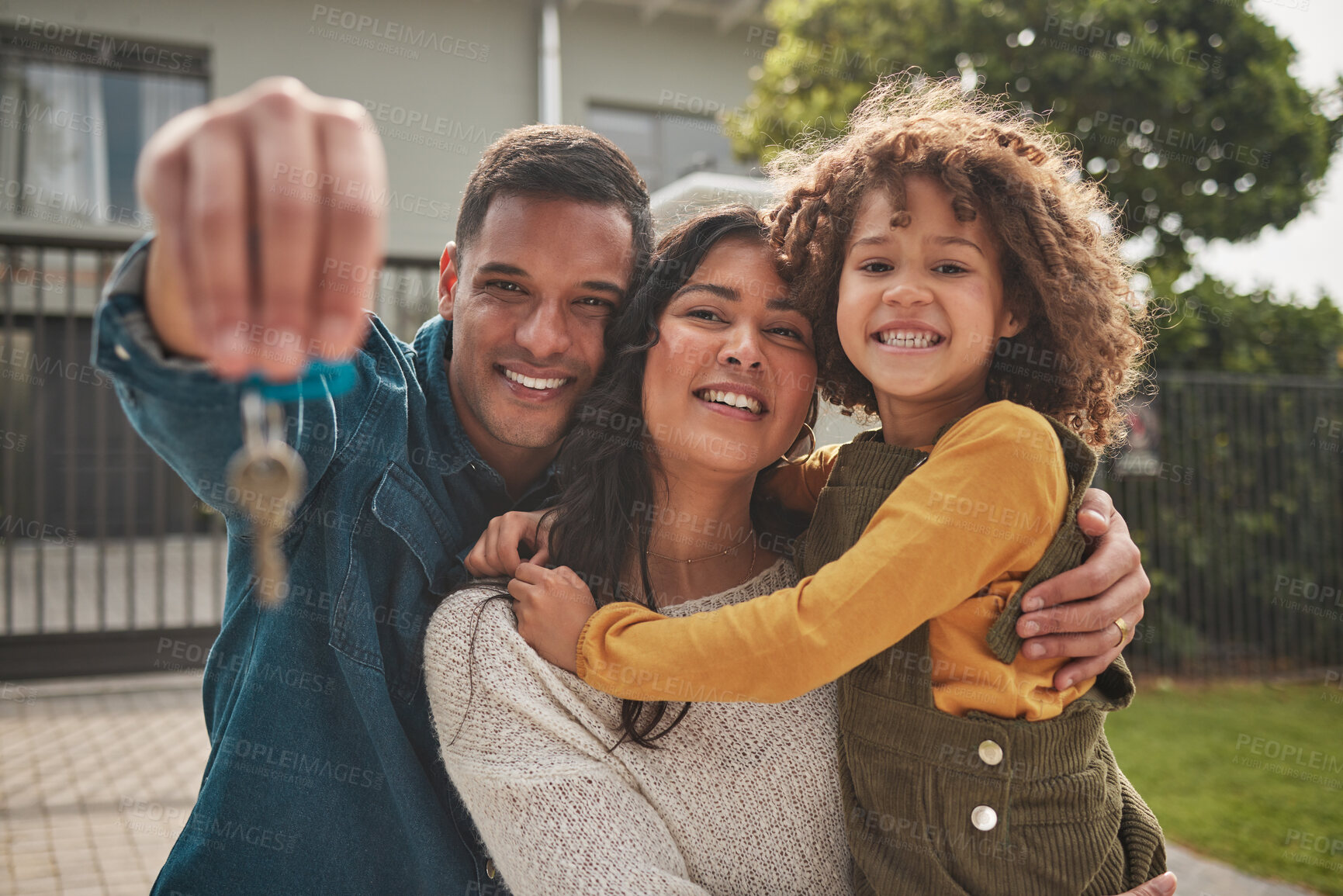 Buy stock photo Happy family, portrait and real estate with keys in property, investment or new home together. Mother, father and child smile in relocation, buying or mortgage loan in building, finance or investing