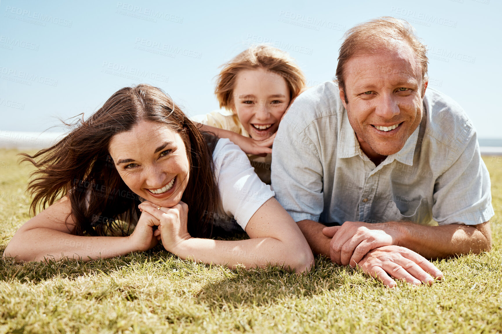 Buy stock photo Portrait, family and smile on vacation at beach, bonding and funny laugh together. Parents, children and mother with father at ocean, happy and having fun to travel on summer holiday outdoor at sea