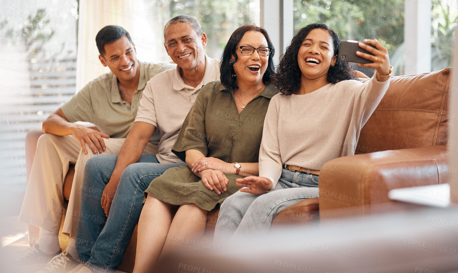 Buy stock photo Happy family, sofa and selfie laughing in photography, memory or holiday weekend and bonding together at home. Couple and parents smile for photograph, picture or social media on living room couch