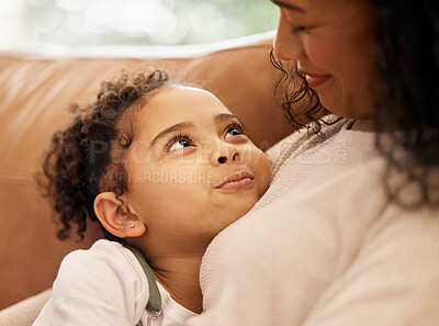Buy stock photo Love, hug and mother with girl child on a sofa with trust, support and bond at home together. Family, relax and face of kid embrace mom in a living room with conversation, safety or security in house