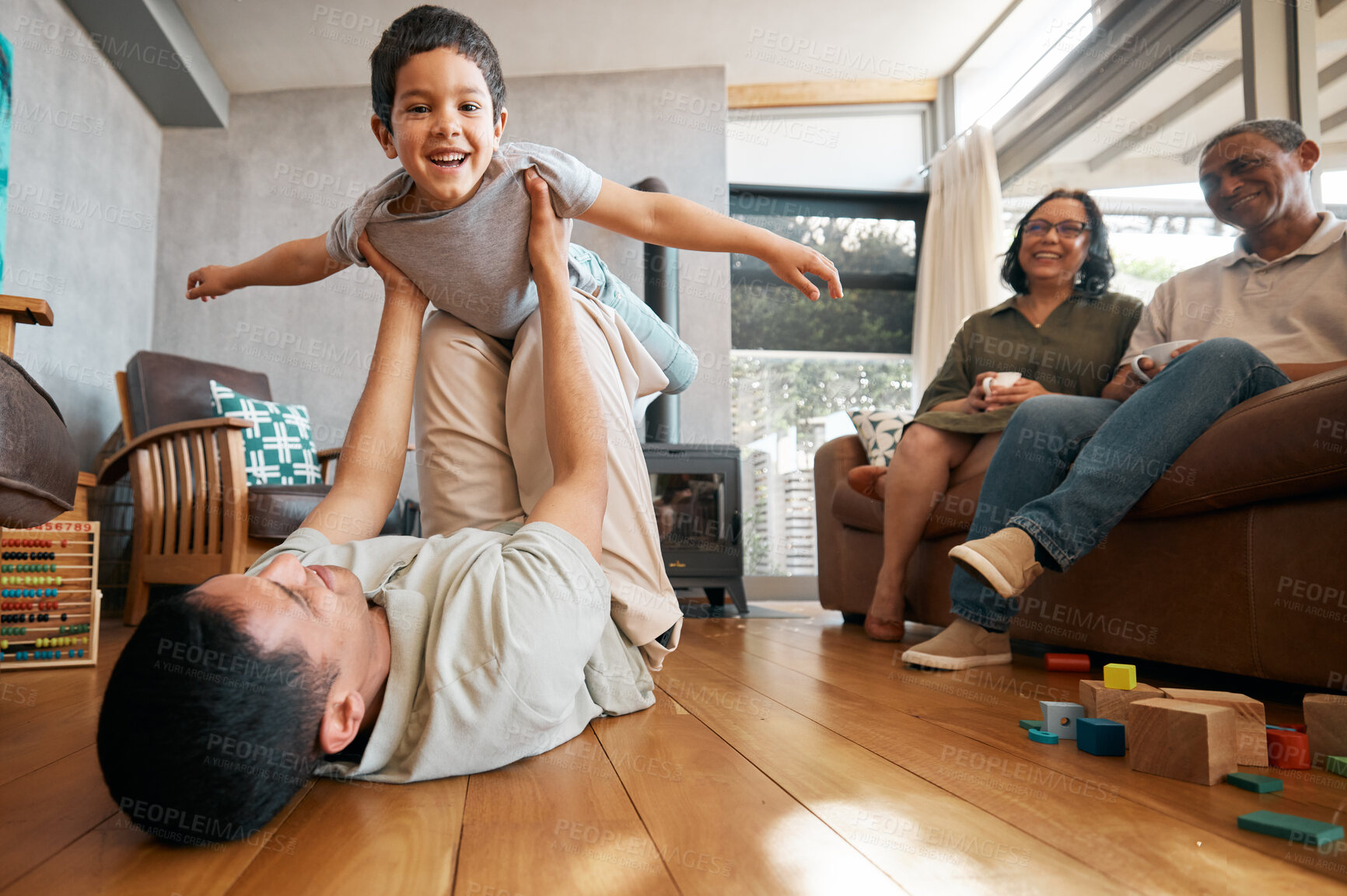 Buy stock photo Airplane, portrait and boy child with father on a floor for playing, games and bond at home with grandparents. Flying, fantasy and excited kid with parent in living room for fun family time in house