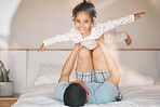Child, happy and father on bed for airplane games, support or relax at home for crazy fun. Portrait, dad and girl kid excited to fly in bedroom for freedom, fantasy or balance of play, care or energy