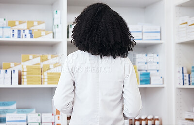 Buy stock photo Healthcare woman, pharmacy and medicine on shelf with pills or medication for inspection or inventory. Back of pharmacist person or medical staff to check stock or pharmaceutical product at drugstore