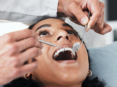 Buy stock photo Mouth, face of woman and dentist with tools for dental, healthcare, assessment and test in clinic. Oral wellness, orthodontics and patient with medical doctor, mirror and excavator for teeth cleaning