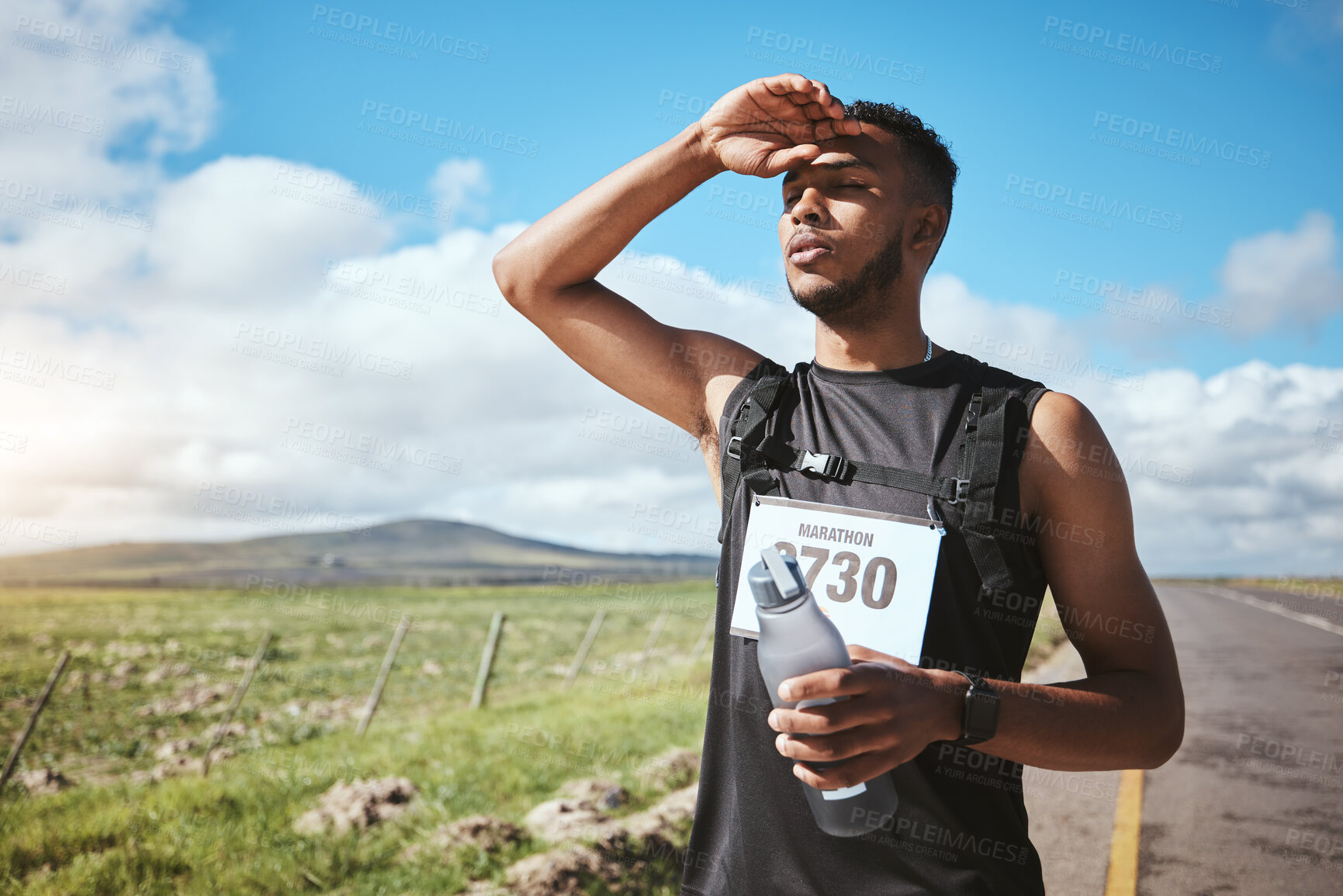 Buy stock photo Fatigue, marathon runner and man with water outdoor on road, fitness and healthy body. Tired, bottle and exhausted athlete sweat in training, exercise and workout in race competition at countryside