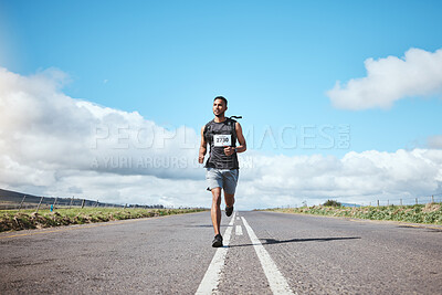 Buy stock photo Sport, marathon runner and man on road outdoor, cardio or healthy body. Athlete, training and fitness exercise in competition, workout energy or race on street in wellness at countryside mockup space