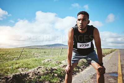Buy stock photo Tired, sports and man with fitness, wellness or exhausted with workout, breathing or training. Person, runner or athlete outdoor, exercise or fatigue with rest, challenge or sweat with intense cardio