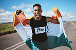 Celebration, portrait and man with flag of India or runner on a road in nature for success in race, competition or marathon. Sports, winner and athlete cheering for cardio, running or achievement
