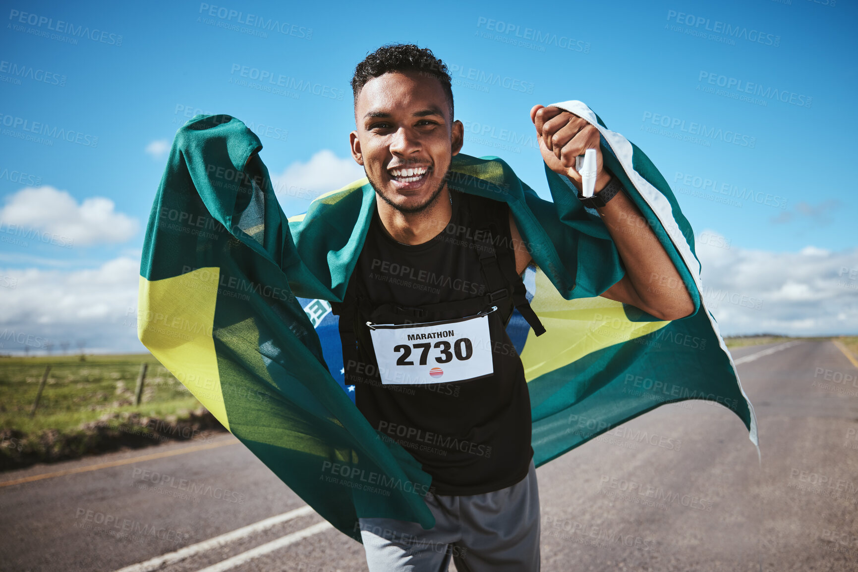 Buy stock photo Portrait, fitness and flag of Brazil with a man runner on a street in nature for motivation or success. Face, winner celebration or health with an athlete cheering during cardio or endurance training