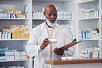 Pharmacy medicine, clipboard and mature black man reading product description, package info or checklist for clinic inventory. List, medical pills box and pharmacist check pharmaceutical supplements