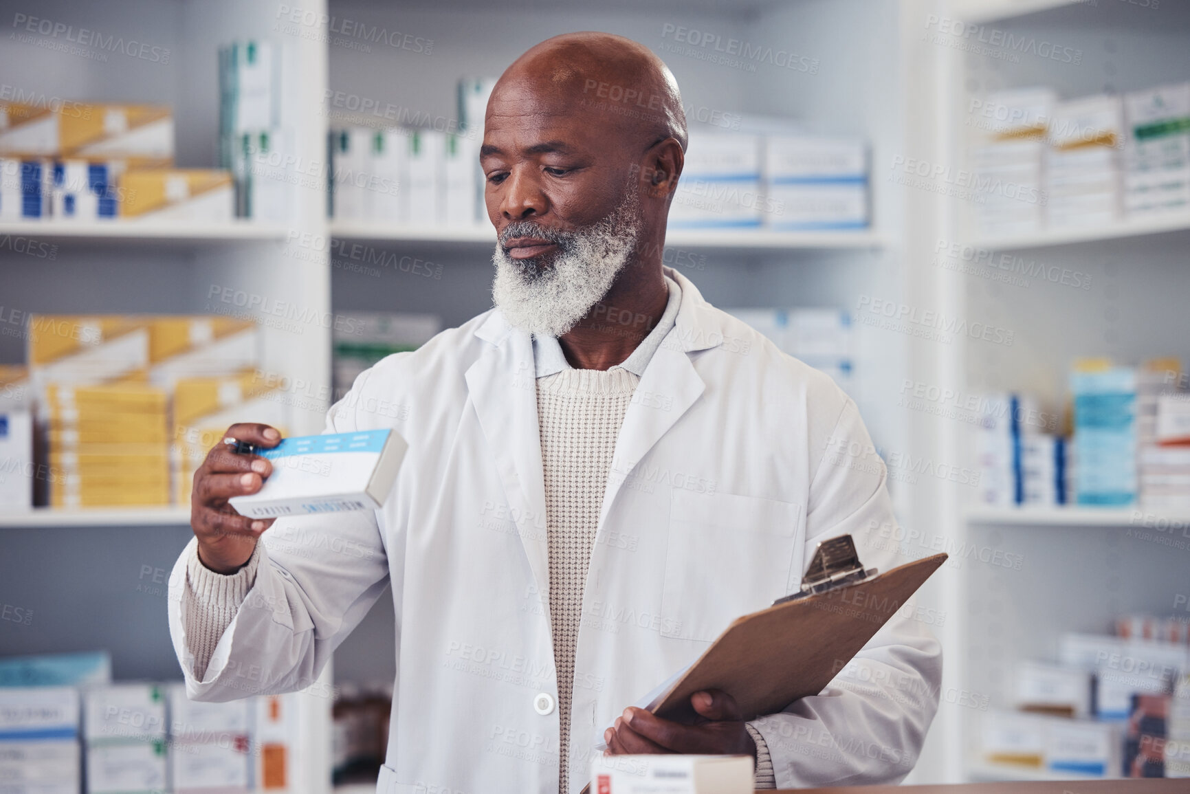 Buy stock photo Pharmacy, medicine or mature black man reading product description, package information or clinic inventory of hospital stock. Box, medical pills or African pharmacist check pharmaceutical supplement