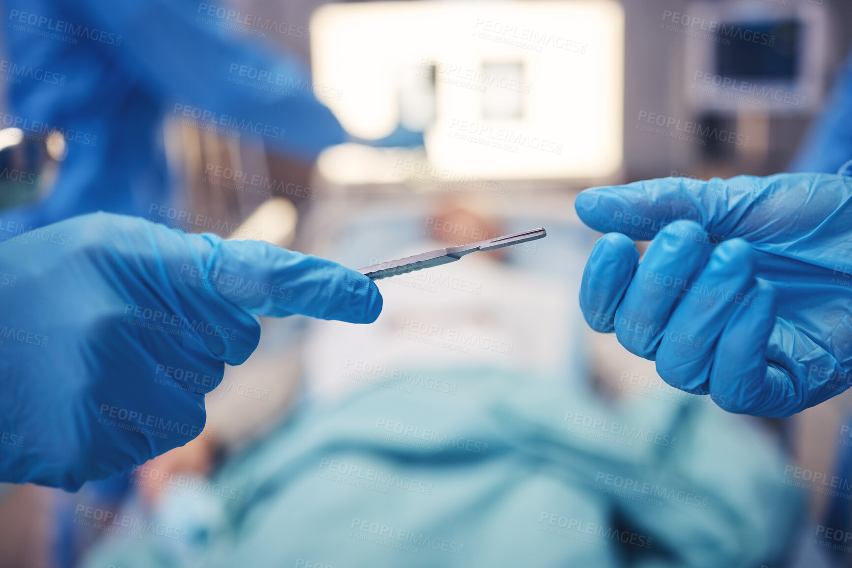Buy stock photo Hands, scalpel for surgery and collaboration in a hospital during an operation or emergency medical procedure. Teamwork, healthcare equipment and doctors in theatre together to save a patient closeup