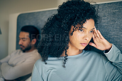 Buy stock photo Couple, fight and stress in bedroom for divorce, anger and thinking of breakup, cheating and anxiety. Face of frustrated, sad and depressed woman with partner in bed for conflict, argument and drama 