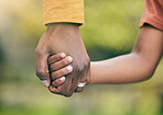 Park, holding hands and family child, parent and walk in forest, woods and relax journey for love, security and support. Closeup, unity and kid bonding, freedom and together in natural nature garden