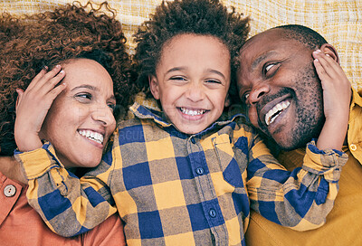 Buy stock photo Top view, child or portrait of parents with smile, love or freedom to relax for bonding together. Black family, home or face of happy kid playing with African father or mother on floor on fun holiday