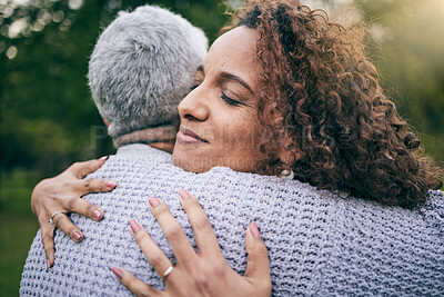 Buy stock photo Elderly mother, woman and hug at park with love, care and bonding for trust, support and wellness outdoor. Senior mom, adult daughter and embrace in nature for healthy relationship of family together