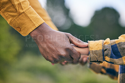 Buy stock photo Park, holding hands and nature child, parent or family quality time, kindness and care on outdoor adventure, wellness or love. Support, relationship and kid freedom, connect or closeup people bonding