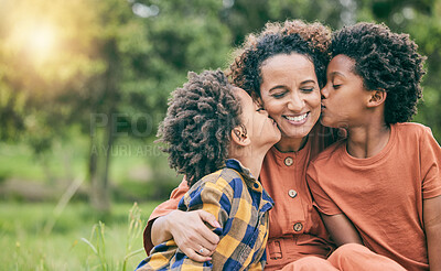 Buy stock photo Happy, kiss and mother with children in park for relax, bonding and love mockup. Care, support and smile with woman and kids in grass field in nature for black family, summer and happiness together
