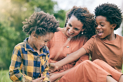 Buy stock photo Happy, playful and mother with children in park for relax, bonding and love. Care, support and smile with woman and kids in grass field in nature for black family, summer and happiness together
