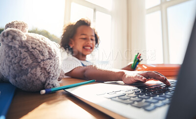 Buy stock photo Hand, laptop and education with a girl in her bedroom for remote learning or private home school. Computer, children and homework with a young female kid at a desk for growth or child development