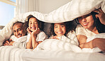 Happy family, bed and under blanket in home bedroom while comfortable, portrait and together. African woman, man and kids lying with cover for security, wake up and relax with mother and father