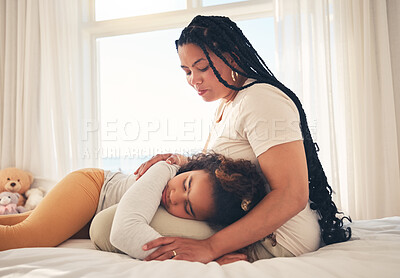 Buy stock photo Family, mother and sad child for support lying on lap, relax and comfort in bedroom of house for depression. Love, woman and girl show care together, rest and bonding with peace on bed in apartment 