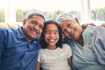 Buy stock photo Grandparents, portrait and happy kid in home living room on sofa, bonding or having fun together. Face, grandmother and grandfather with child in lounge to relax with love, care and family connection