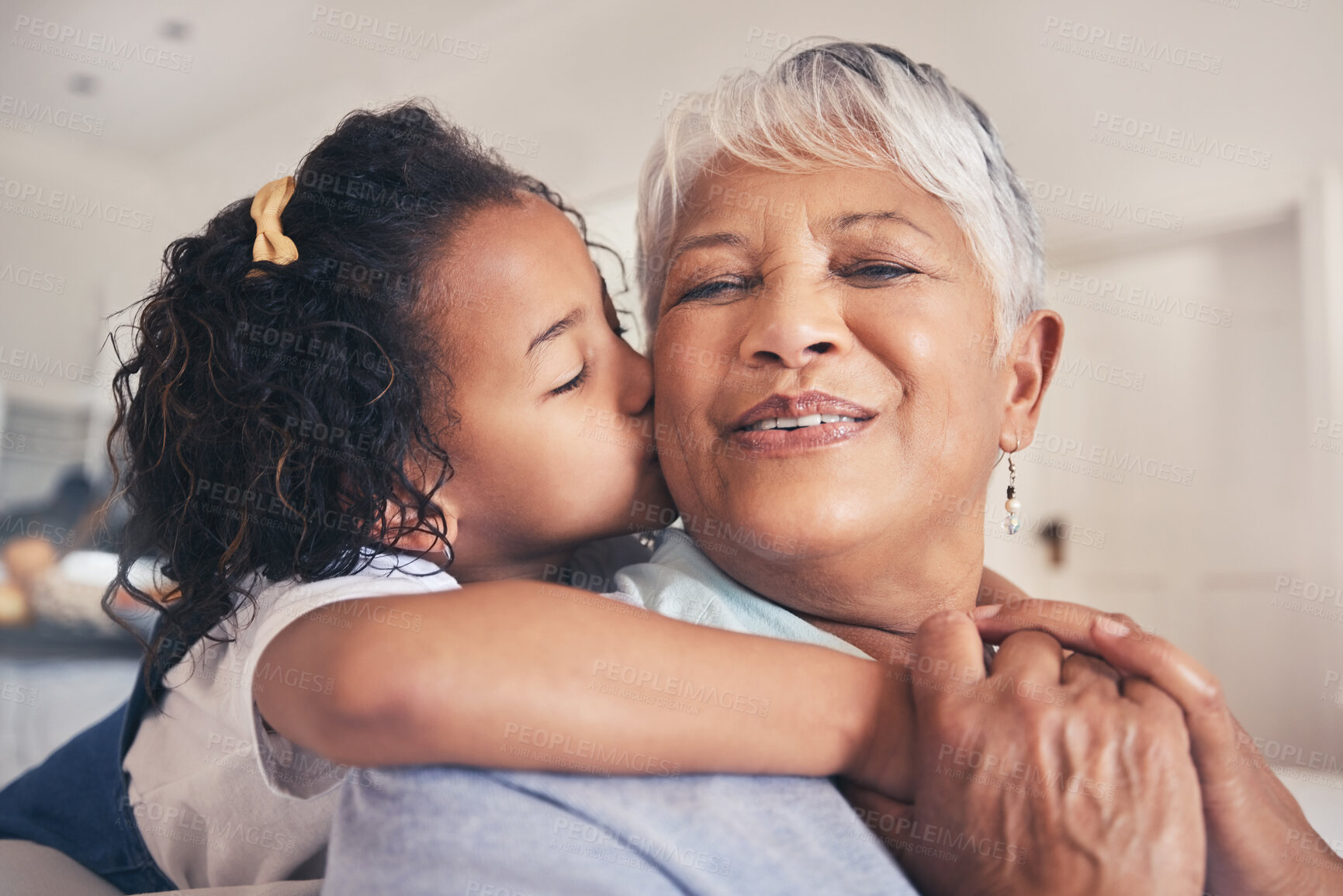 Buy stock photo Hug, kiss or child with grandma in living room of family house with trust, care or love in retirement. Senior granny, face or happy grandmother bonding with kid to relax with smile, joy or freedom