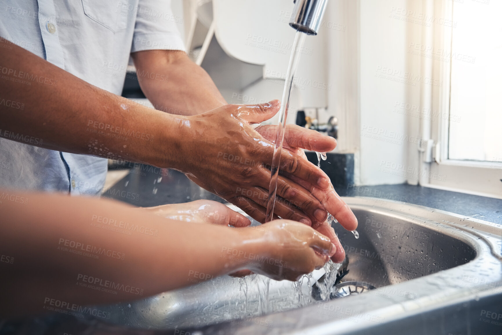 Buy stock photo Clean, hands and people with water in home and learning about hygiene, wellness and washing with soap in kitchen. Hand, cleaning and care for health, safety and protection from bacteria or virus