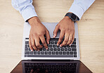 Laptop, above and hands of business person in office for networking, website and research. Cybersecurity, programming and worker on computer typing for information technology, coding software or data