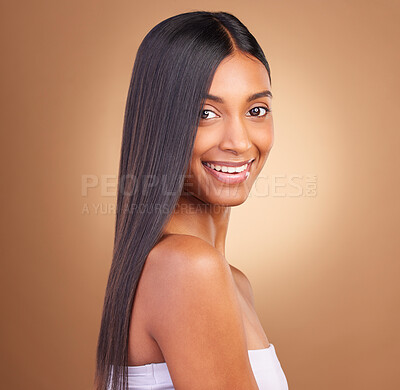 Buy stock photo Portrait, hair care and woman with a smile, cosmetics and skincare on a brown studio background. Face, person and model with natural beauty, aesthetic and glow with dermatology, texture and volume