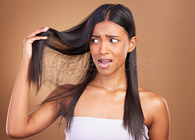 Buy stock photo Beauty, disaster and unhappy woman with hair loss in studio worry, stress or anxiety for damage on brown background. Haircare, fail and lady model with dry scalp mistake, dandruff or alopecia crisis