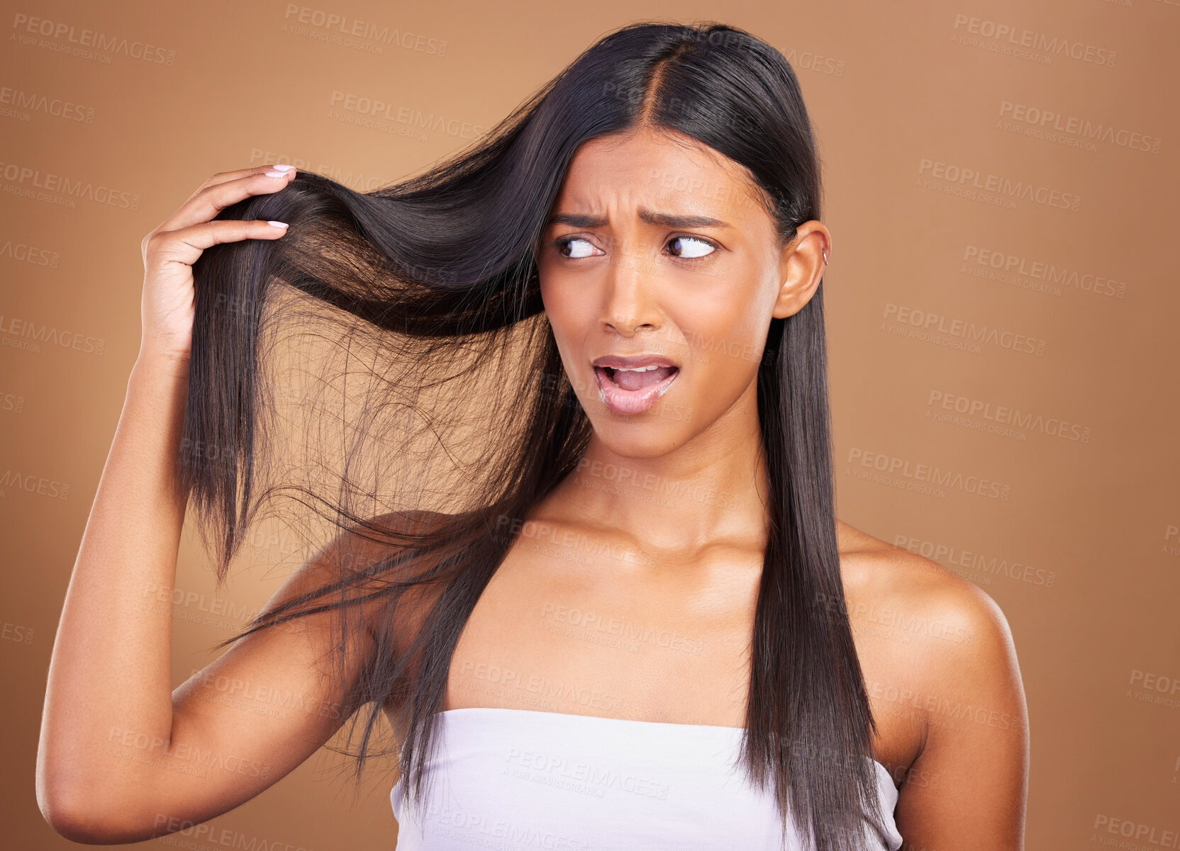 Buy stock photo Beauty, disaster and unhappy woman with hair loss in studio worry, stress or anxiety for damage on brown background. Haircare, fail and lady model with dry scalp mistake, dandruff or alopecia crisis