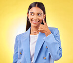 Call me, smile and a woman with hand sign in studio for communication, contact and chat. Indian model person or student thinking of fashion, talk or flirting with emoji or icon on a yellow background