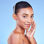 Beauty, wellness and skincare with portrait of woman in studio for cosmetics, dermatology and facial. Glow, self care and health with person on blue background for spa treatment, grooming and makeup