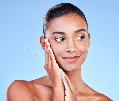 Buy stock photo Beauty, wellness and skincare with face of woman in studio for cosmetics, dermatology and facial. Glow, self care and smile with person on blue background for spa treatment, grooming and makeup