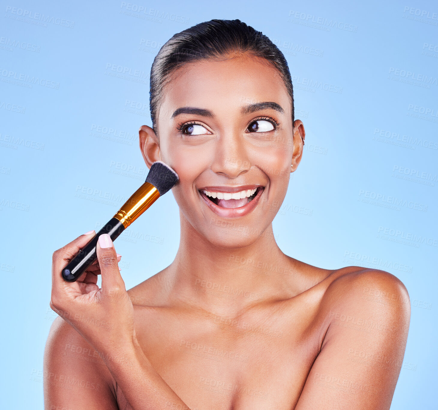 Buy stock photo Beauty, face and woman with makeup brush in studio for powder, cosmetic or application on blue background. Foundation, skincare and lady model with cheek tools for contour, cover or facial treatment